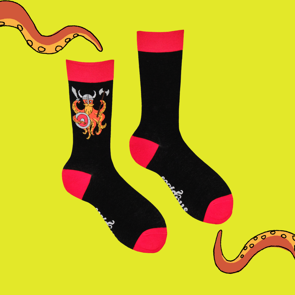 
                      
                        A pair of socks depicting the Soctopus mascot dressed as a viking. Black legs. Red toes, heels, cuffs. 
                      
                    