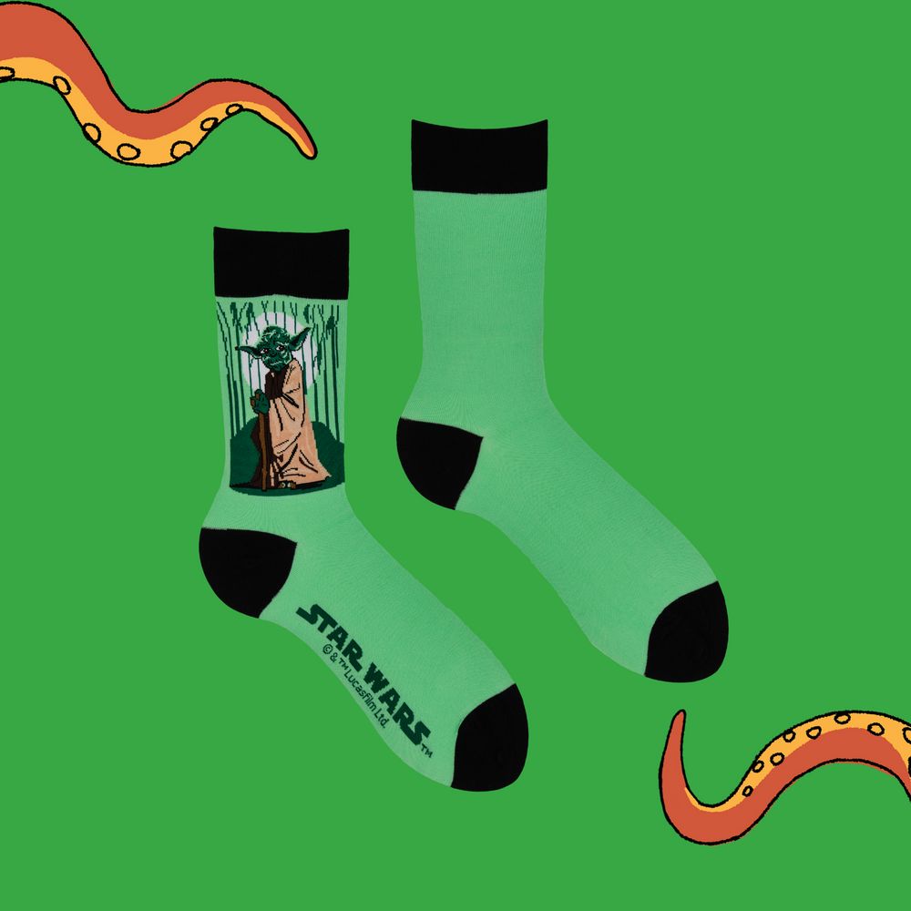 
                      
                        A pair of socks depicting Master Yoda. Green legs. Dark green cuff, toe and heel.
                      
                    