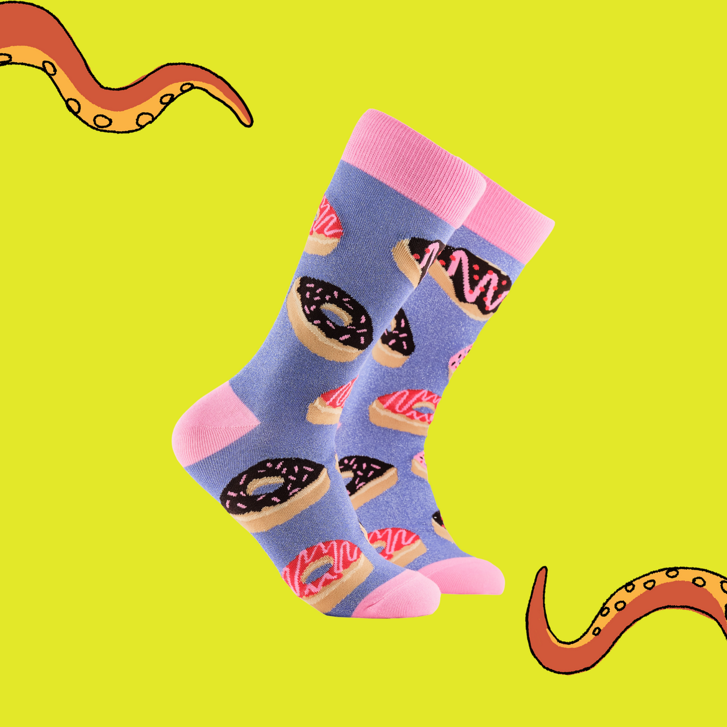 
                  
                    A pair of socks depicting iced doughnuts. Light purple legs, pink cuff, heel and toe.
                  
                