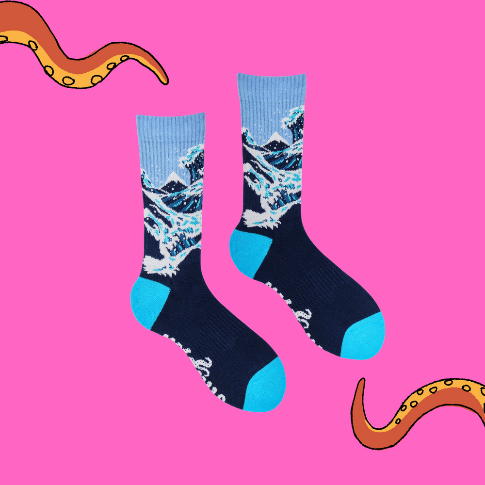 
                      
                        A pair of athletic socks featuring the classic wave art print. Blue and white. 
                      
                    