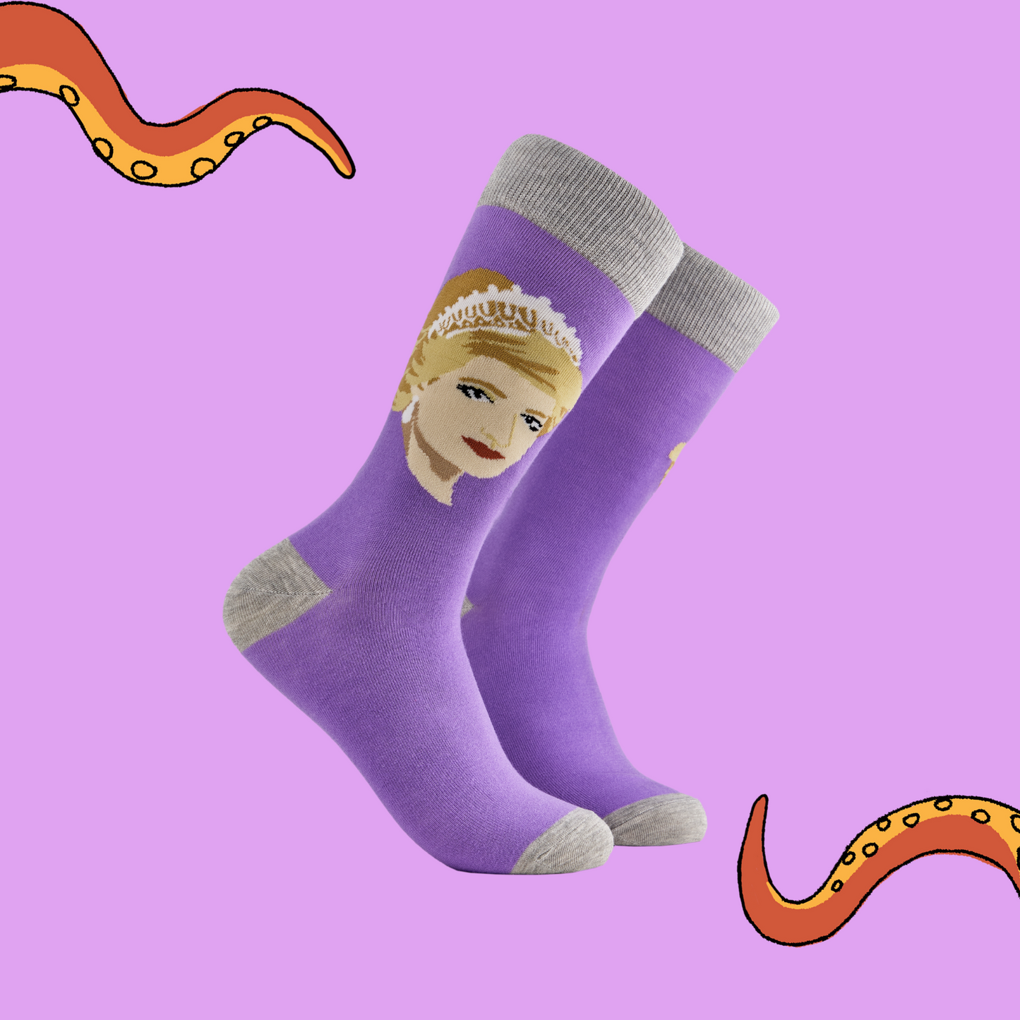 A pair of socks depicting princess Diana. Purple legs, grey cuff, heel and toe.