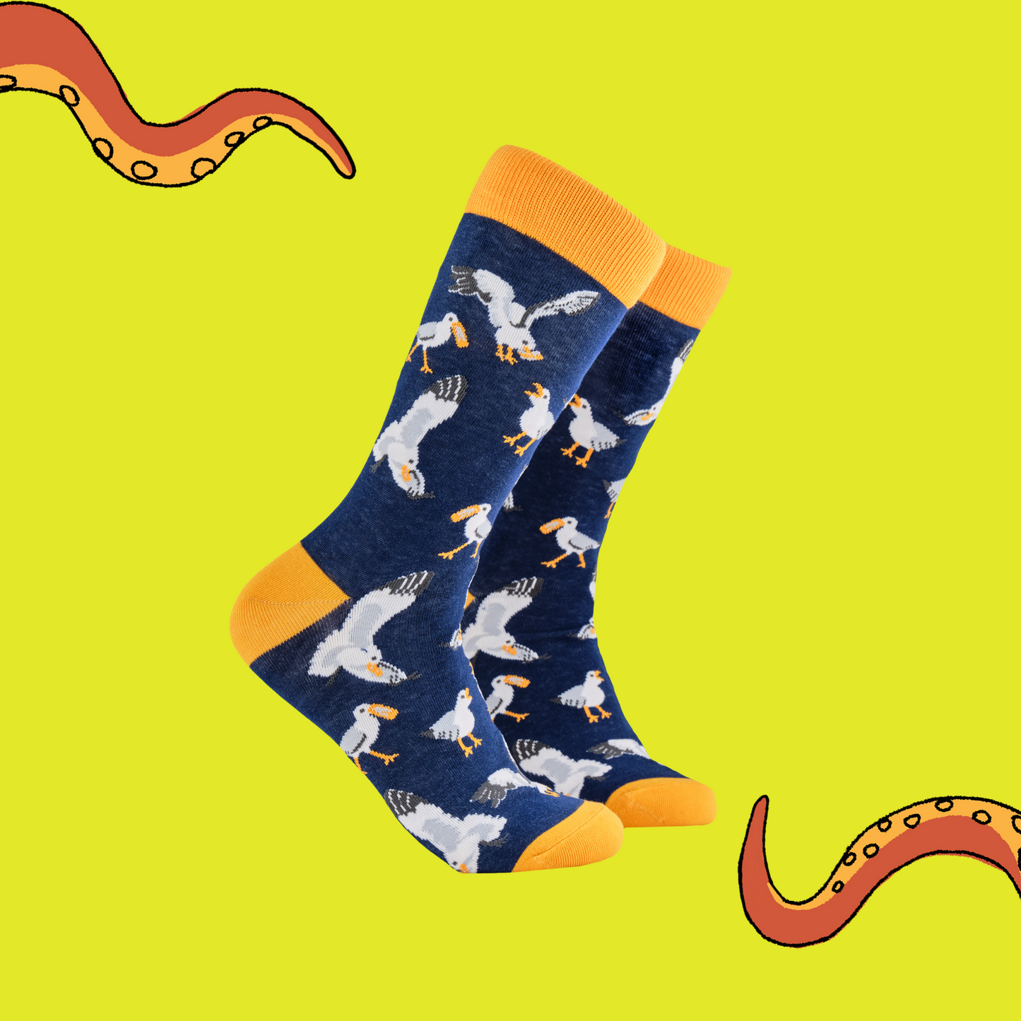 A pair of socks depicting seagulls eating chips. Blue legs, yellow cuff, heel and toe.