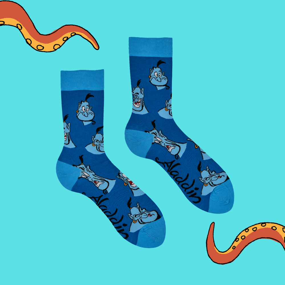 
                      
                        A pair of socks depicting the genie from Aladdin. Blue legs, light blue toe, heel and cuff.
                      
                    