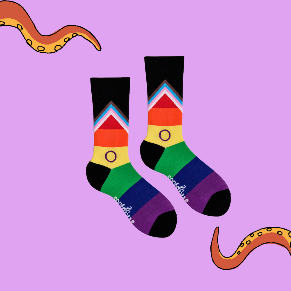 
                      
                        A pair of rainbow socks with an LGBTQ+ motif. 
                      
                    