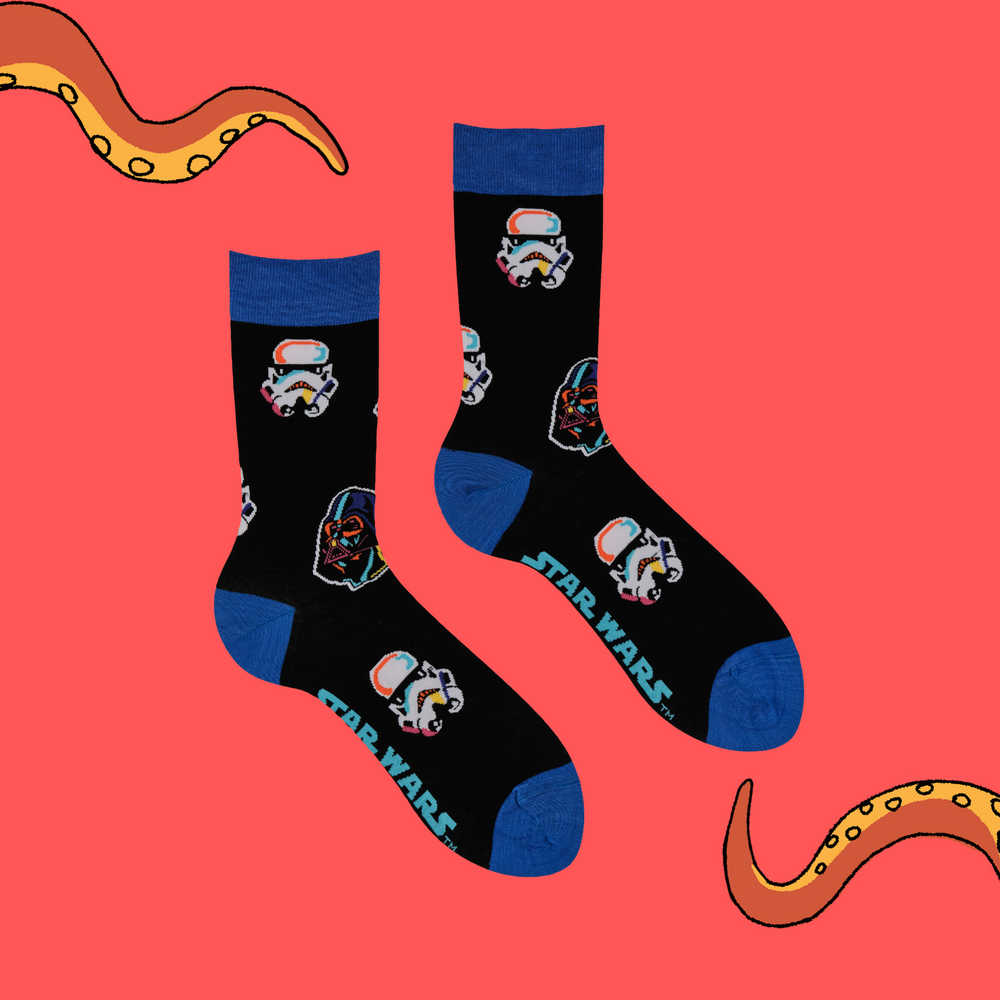 
                      
                        A pair of socks depicting stormtroopers and Darth Vader. Black legs, blue cuff, toe and heel.
                      
                    