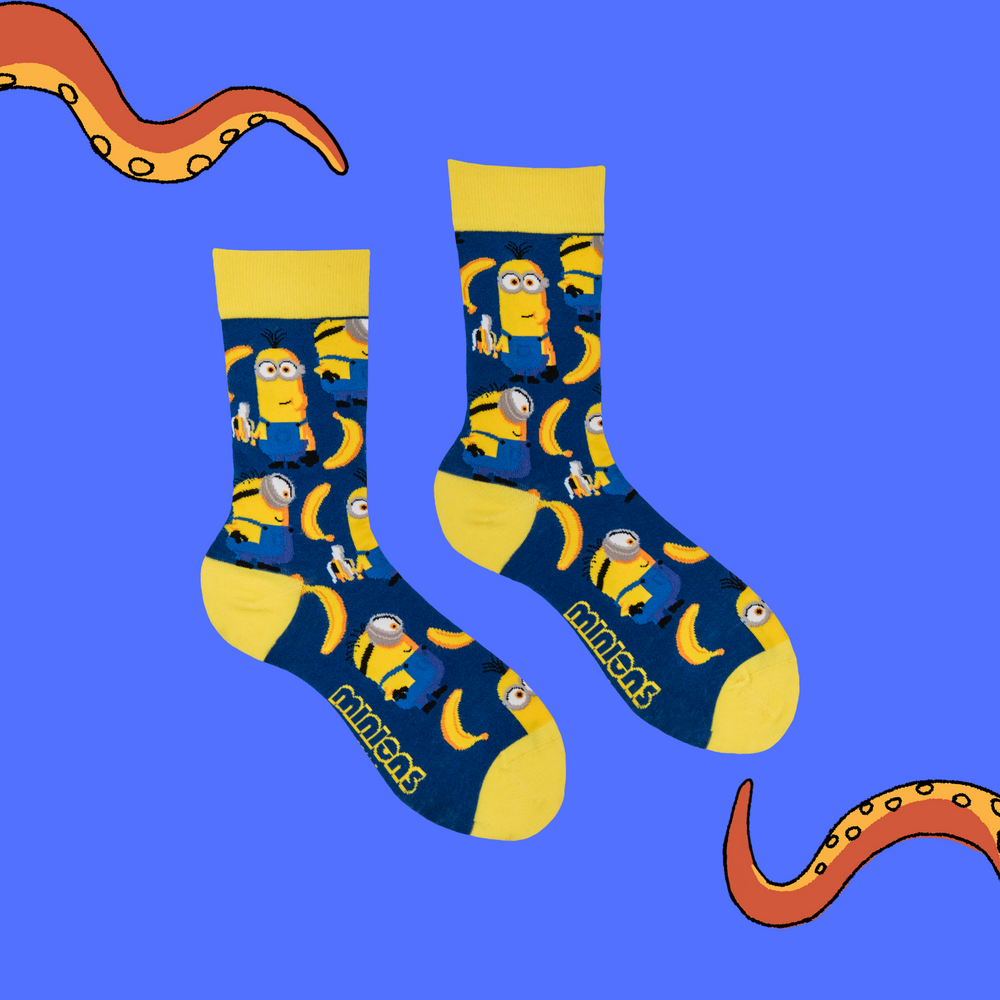 
                      
                        A pair of socks depicting the minions. And bananas. Blue legs, yellow heel toe and cuff. 
                      
                    