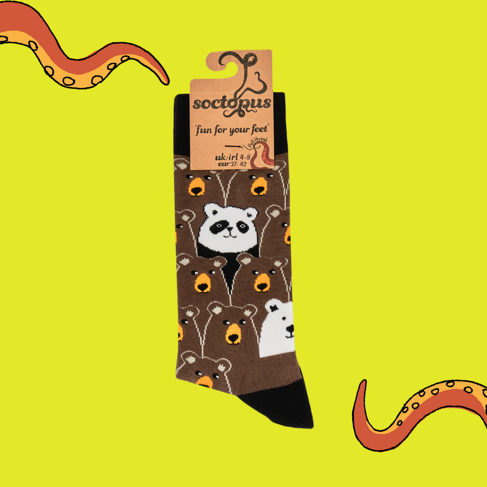 
                      
                        A pair of socks with a fun bear pattern. Brown legs, black heel, toe and cuff. 
                      
                    