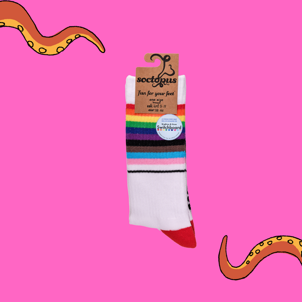 
                  
                    A pair of socks depicting the pride flag. White legs, white cuff, red heel and toe. In Soctopus Packaging.
                  
                