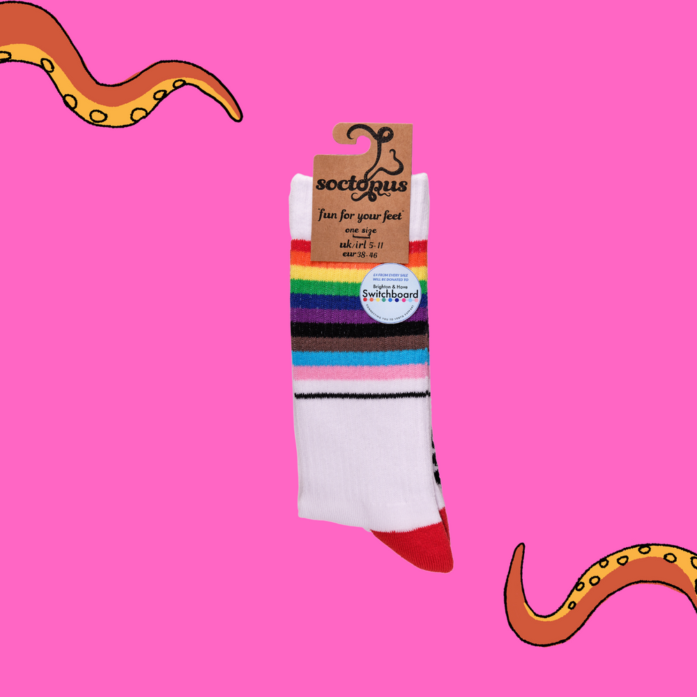 
                      
                        A pair of socks depicting the pride flag. White legs, white cuff, red heel and toe. In Soctopus Packaging.
                      
                    