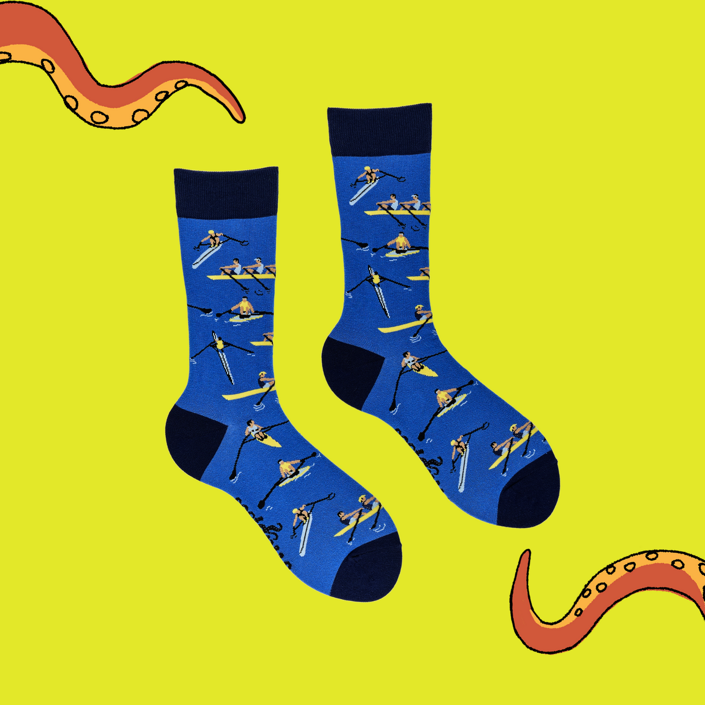 
                  
                    A pair of socks depicting row boat racers. Blue legs, dark blue cuff, heel and toe.
                  
                