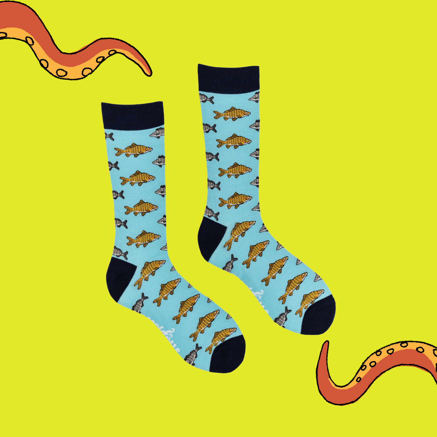 
                  
                    A pair of socks depicting Koi carp fish. Blue legs, dark blue cuff, heel and toe.
                  
                