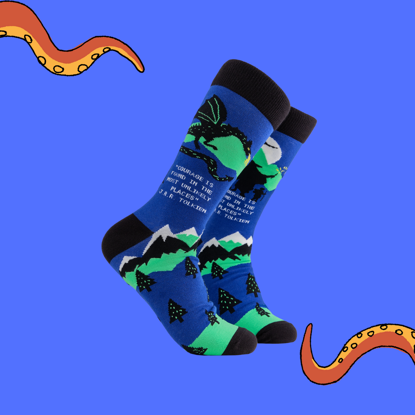 A pair of socks depicting middle earth. Blue legs, black cuff, heel and toe.