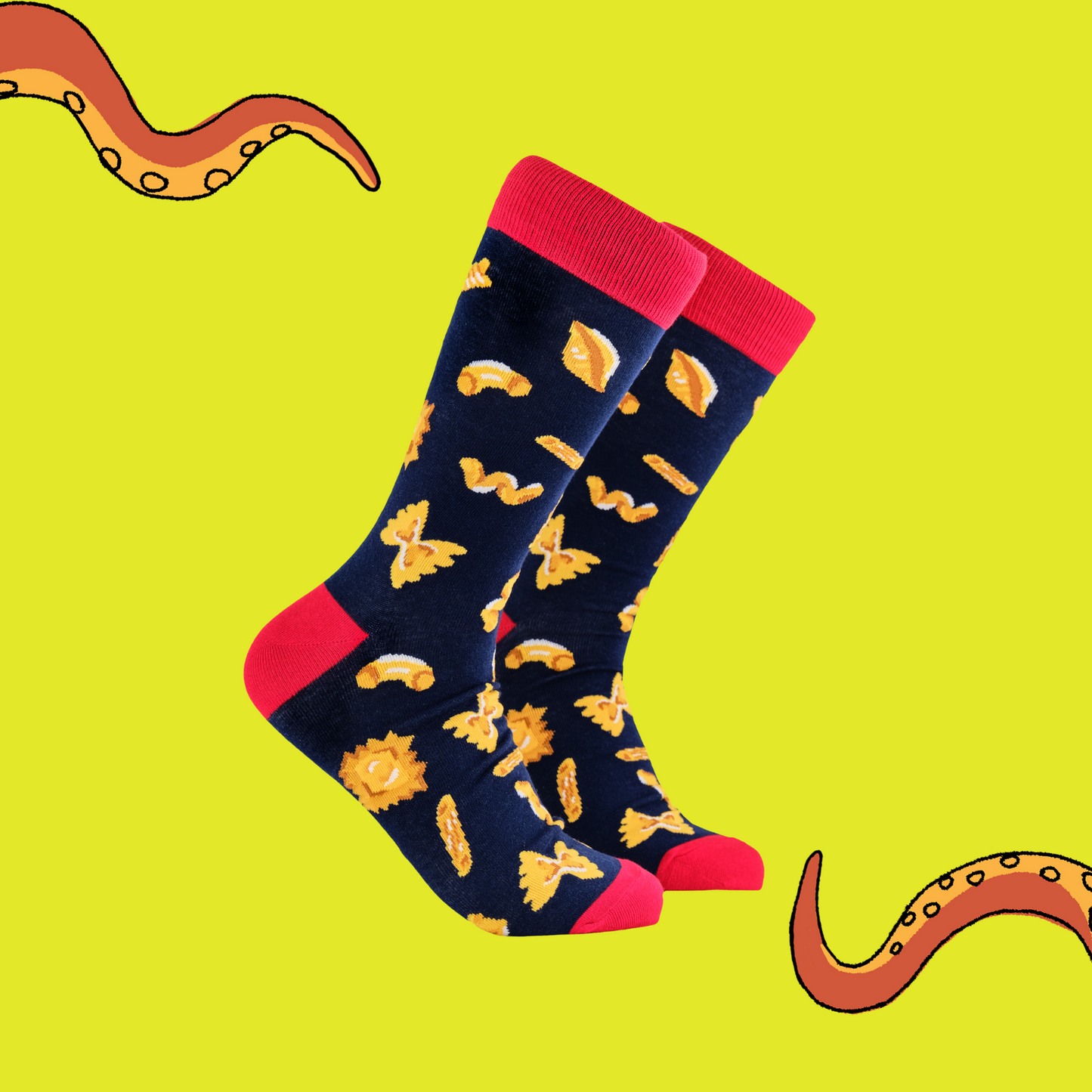 A pair of socks depicting different pasta shapes. Dark blue legs, red cuff, heel and toe.