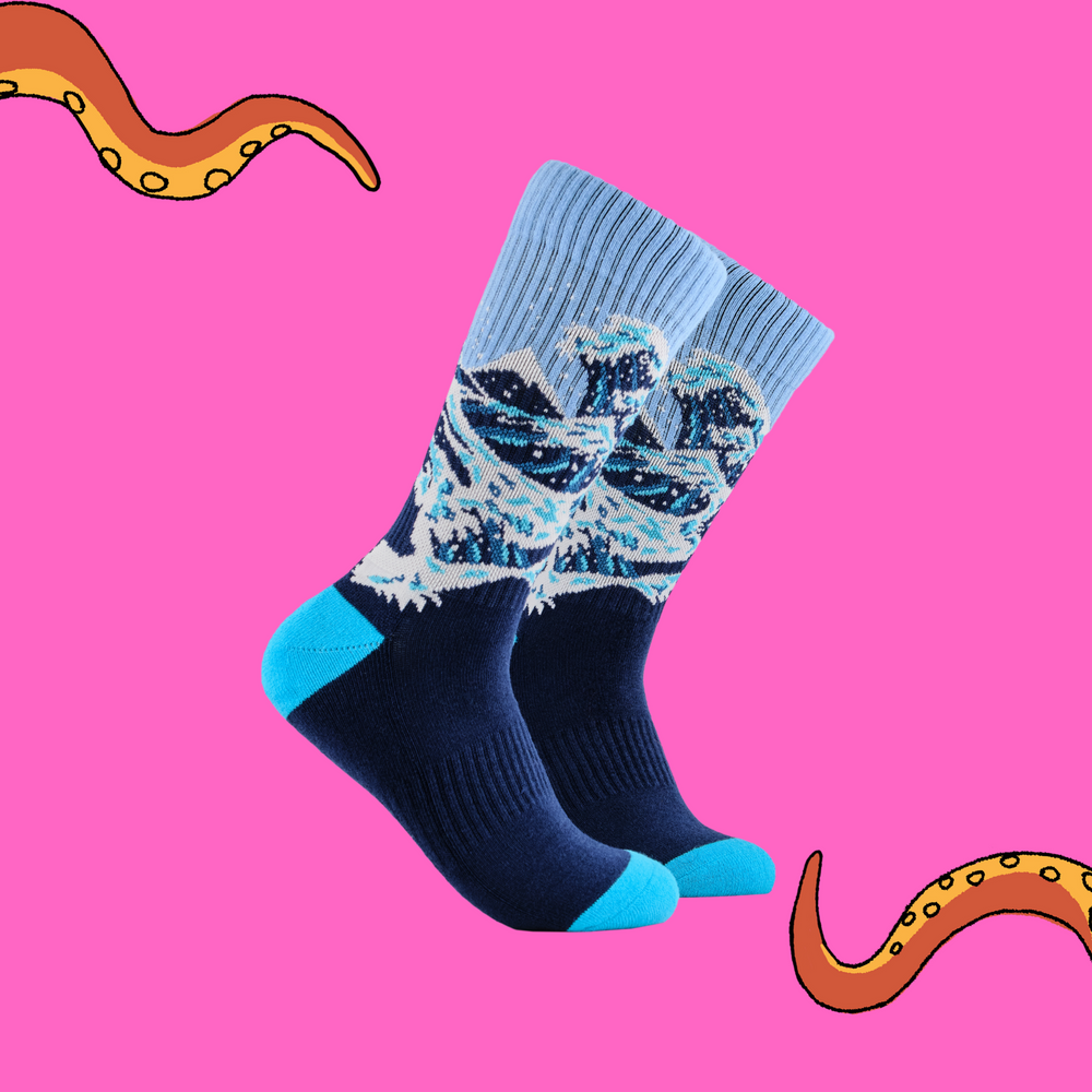 
                      
                        A pair of athletic socks featuring the classic wave art print. Blue and white. 
                      
                    