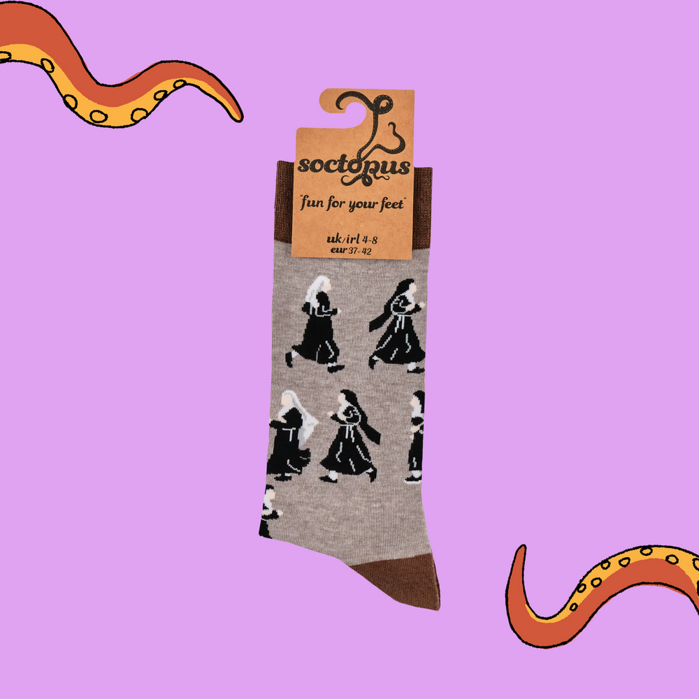 
                      
                        A pair of socks featuring running nuns. Light brown legs, dark brown heel, toe and cuff. 
                      
                    