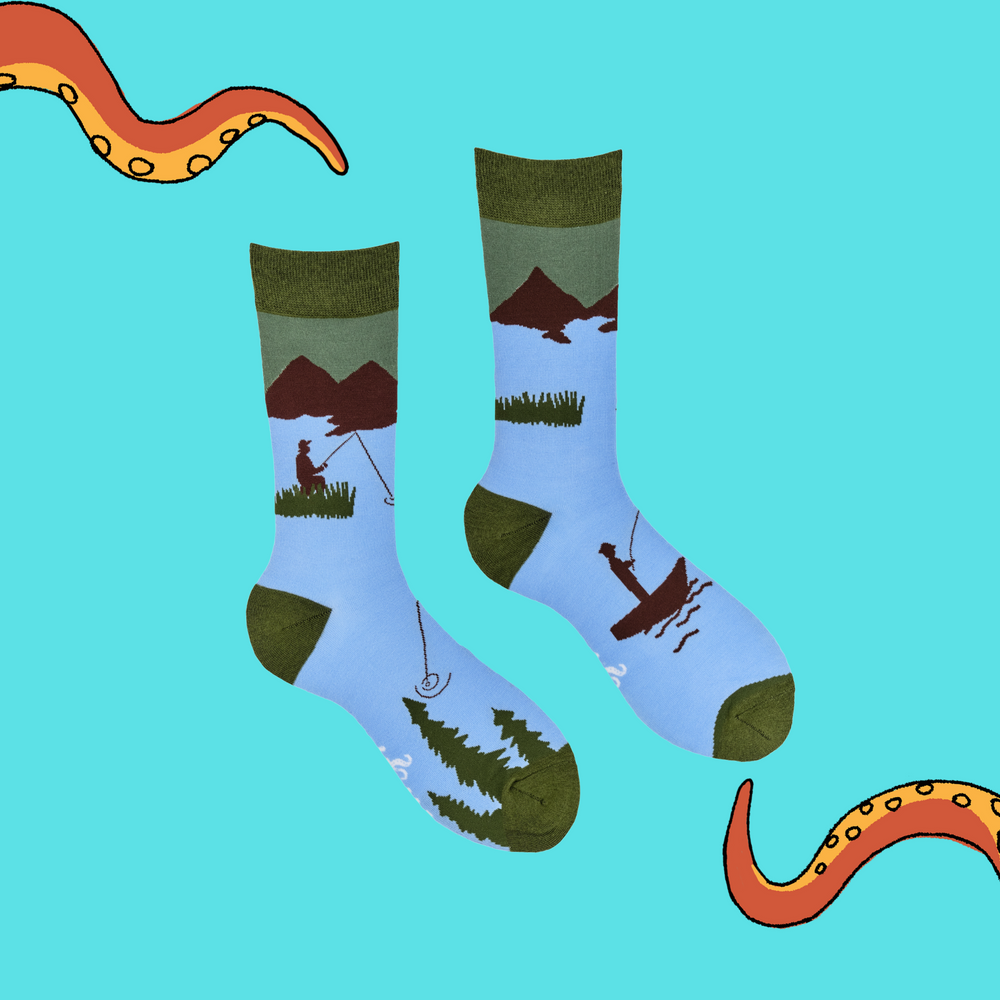 
                      
                        A pair of socks depicting fishermen on the water. Blue legs, green cuff, heel and toe.
                      
                    