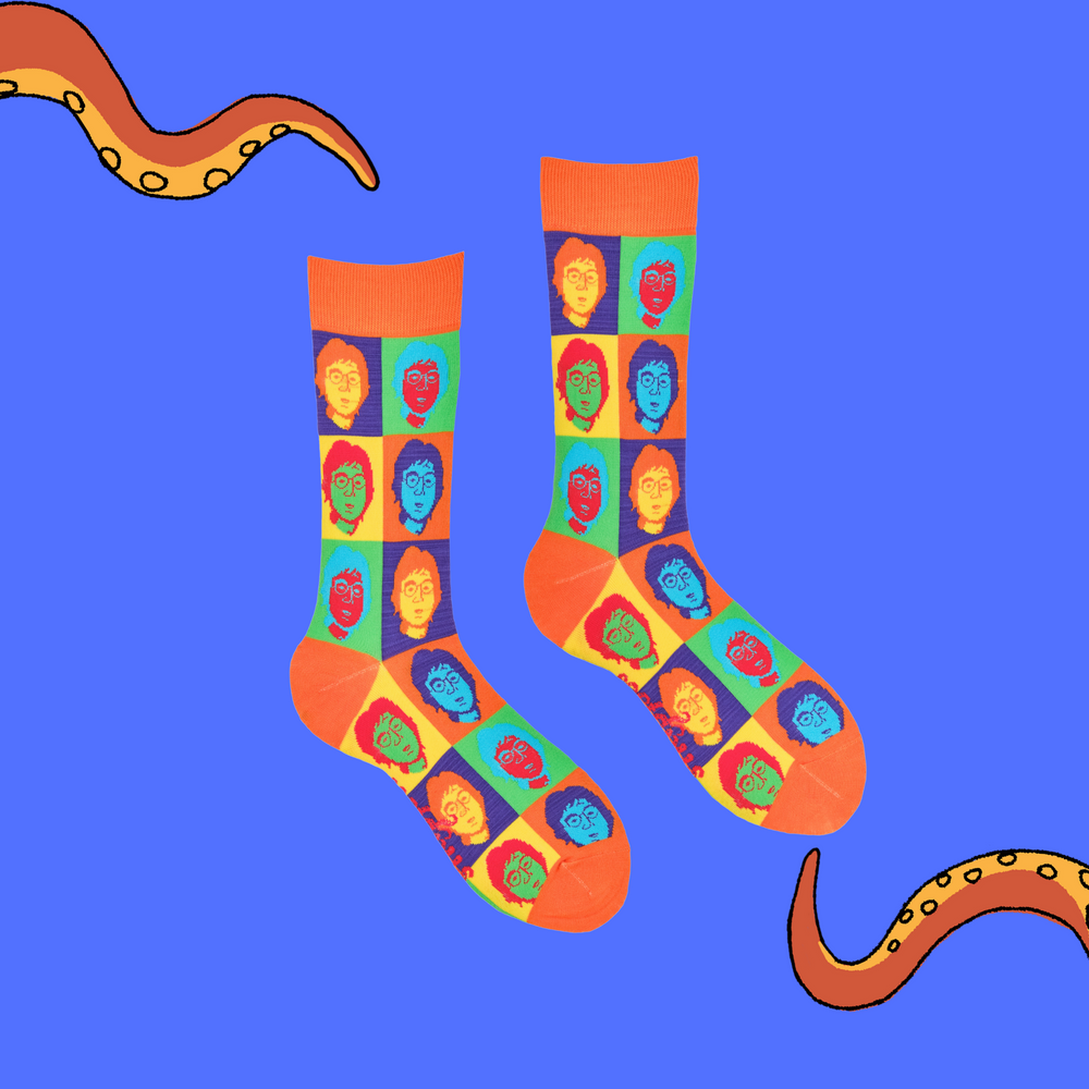 
                  
                    A pair of socks depicting John Lennon's face. Multicoloured legs, orange cuff, heel and toe.
                  
                