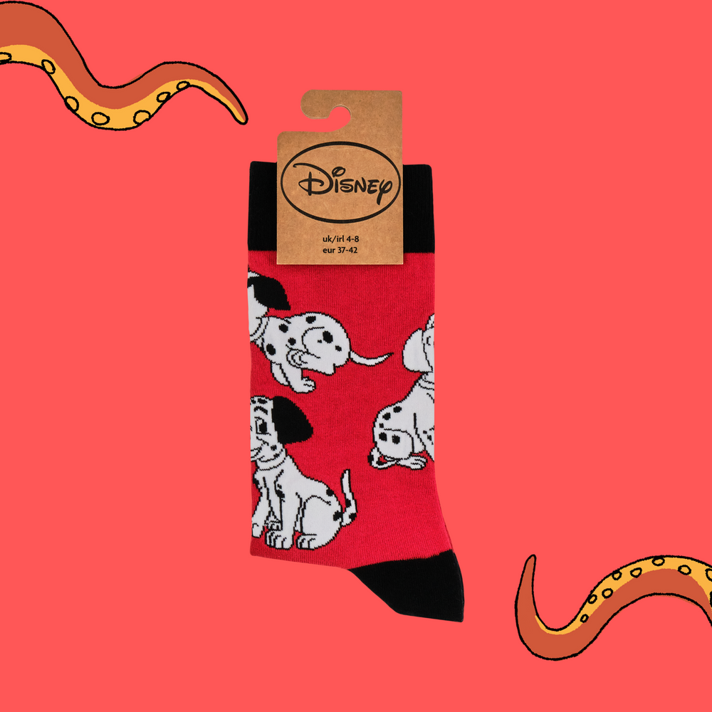 
                      
                        A pair of socks featuring characters from the 1961 disney hit, 101 dalmatians. Red legs, black toe, heel and cuff. 
                      
                    