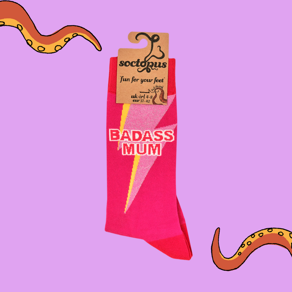 
                      
                        A pair of socks with he slogan Badass Mum. Pink legs, red heel, toe and cuff. 
                      
                    