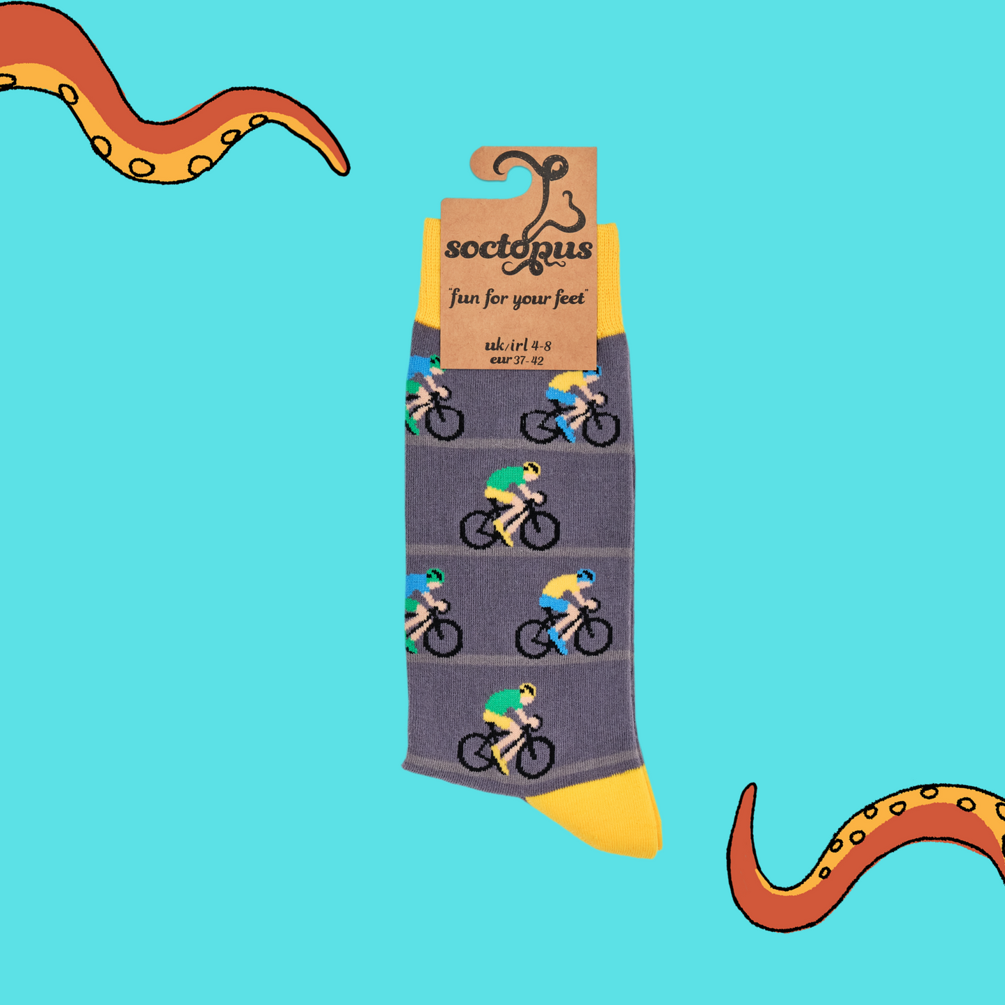 
                  
                    A pair of socks depicting racing cycles. Grey legs, yellow cuff, heel and toe. In Soctopus Packaging.
                  
                