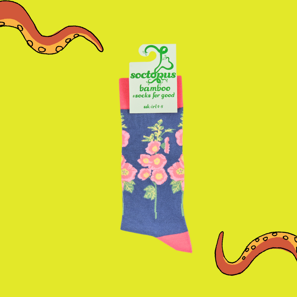 
                      
                        A pair of socks depicting hollyhocks. Blue legs, pink cuff, heel and toe. In Soctopus Packaging.
                      
                    