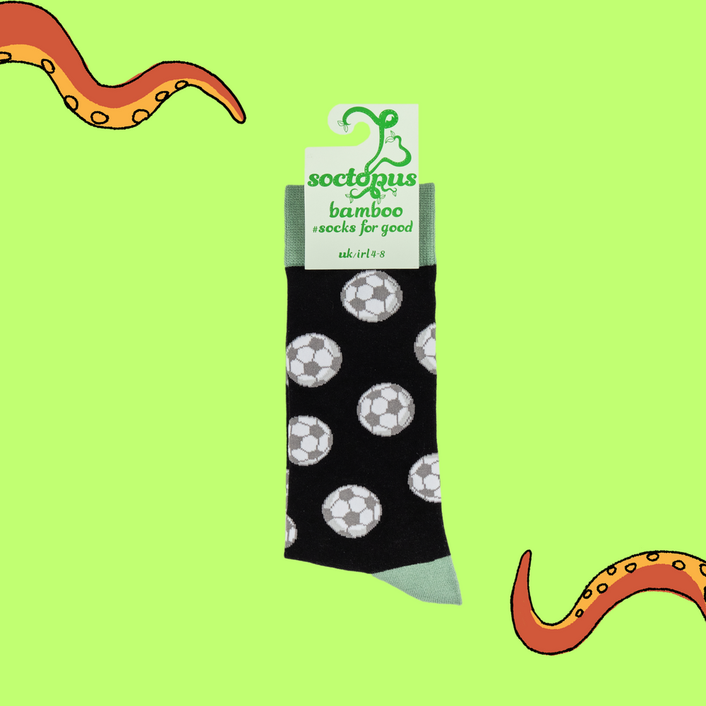 
                      
                        A pair of socks depicting footballs. Black legs, light green cuff, heel and toe. In Soctopus Packaging.
                      
                    