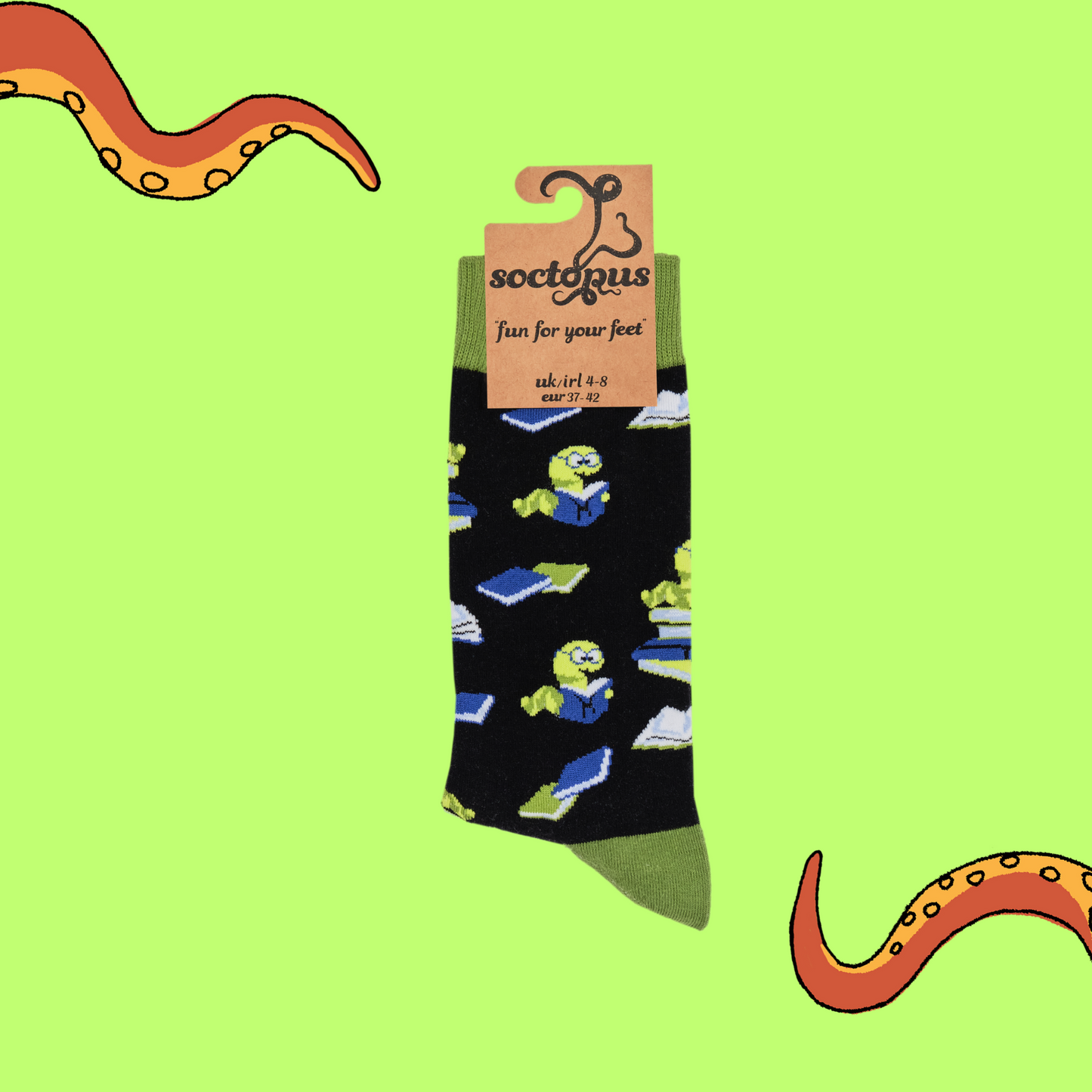 
                  
                    A pair of socks depicting worms reading books. Black legs, green cuff, heel and toe. In Soctopus Packaging.
                  
                
