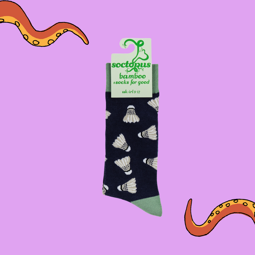 
                      
                        A pair of socks depicting shuttlecocks. Dark blue legs, green cuff, heel and toe. In Soctopus Packaging.
                      
                    