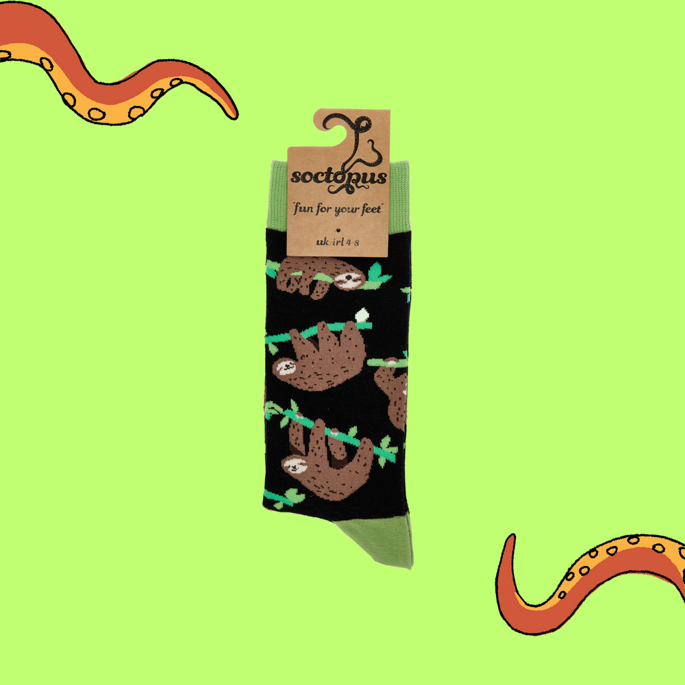 
                  
                    A pair of socks depicting lazy sloths. Black legs, green cuff, heel and toe. In Soctopus Packaging.
                  
                