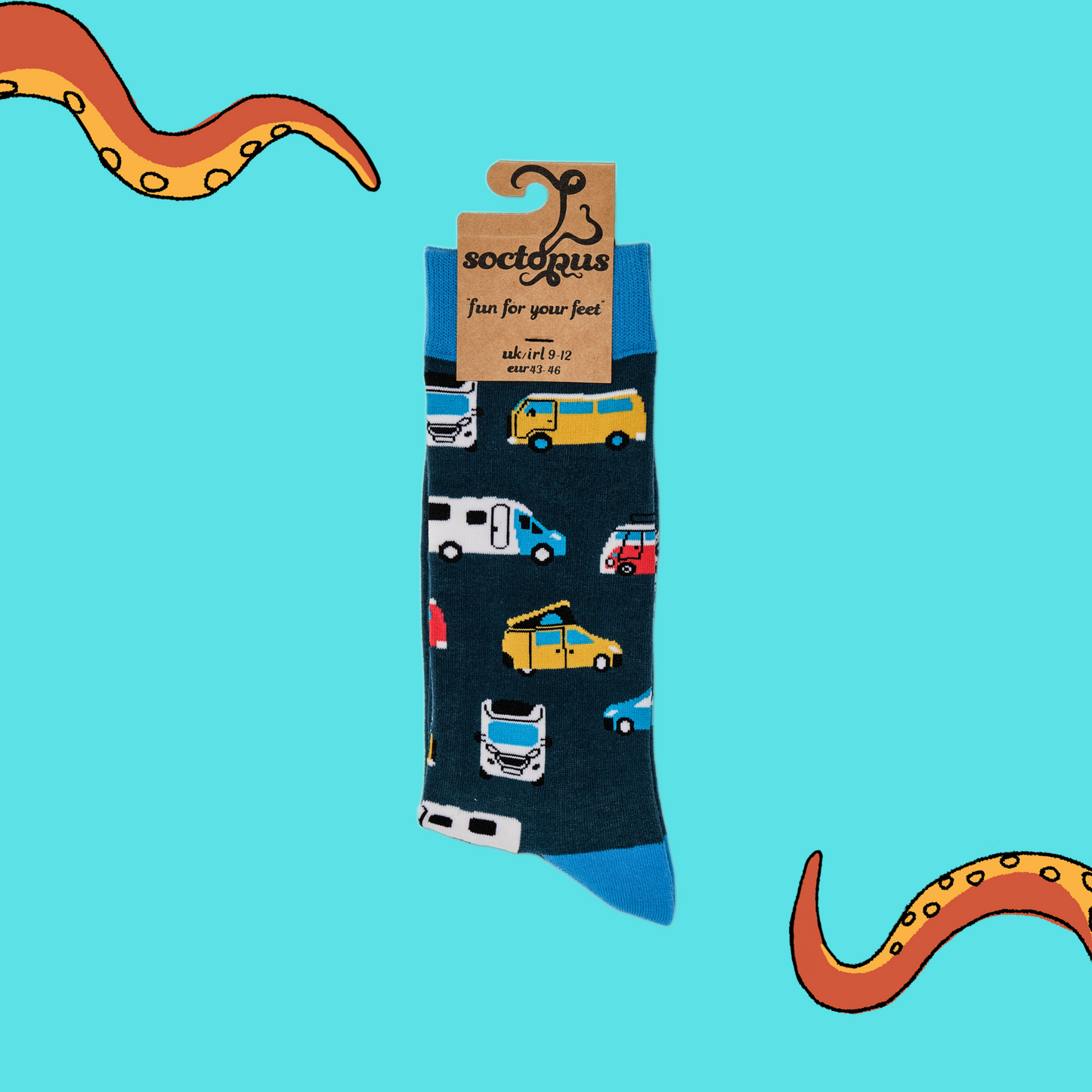 
                  
                    A pair of socks depicting campervans. Dark blue legs, light blue cuff, heel and toe. In Soctopus Packaging.
                  
                
