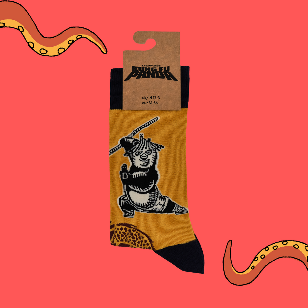 
                      
                        A pair of socks depicting Po striking a Kung Fu pose. Yellow legs, black heel, toe and cuff.
                      
                    