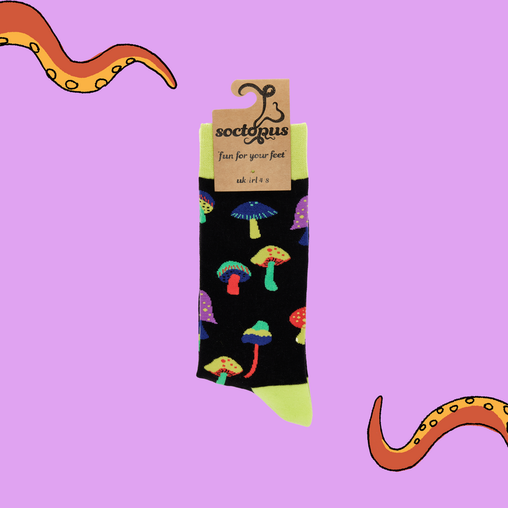 
                  
                    A pair of socks depicting magic mushrooms. Black legs, bright yellow cuff, heel and toe. In Soctopus Packaging.
                  
                