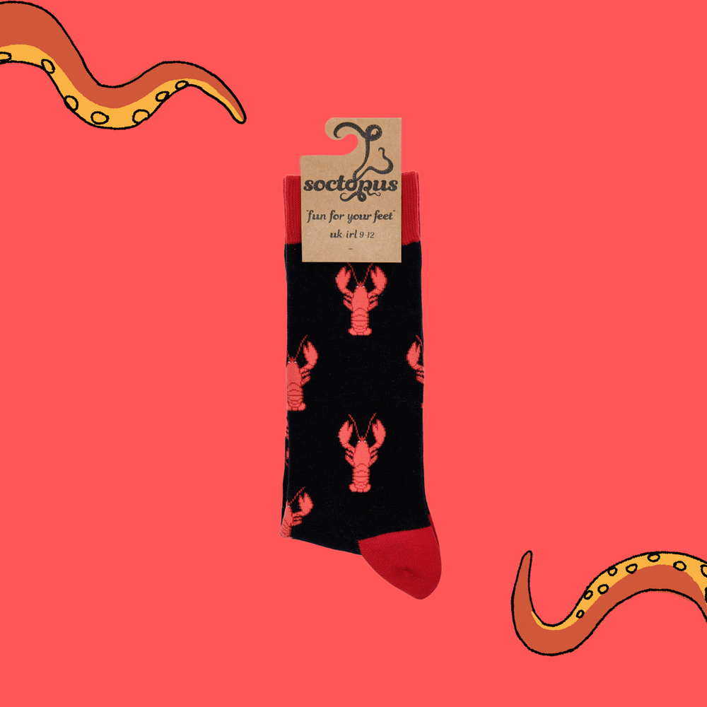 
                  
                    A pair of socks depicting red lobsters. Black legs, red cuff, heel and toe. In Soctopus Packaging.
                  
                