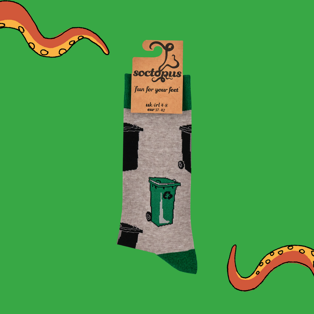 
                      
                        A pair of socks depicting wheelie bins. Brown legs, green toe, cuff and heel. 
                      
                    