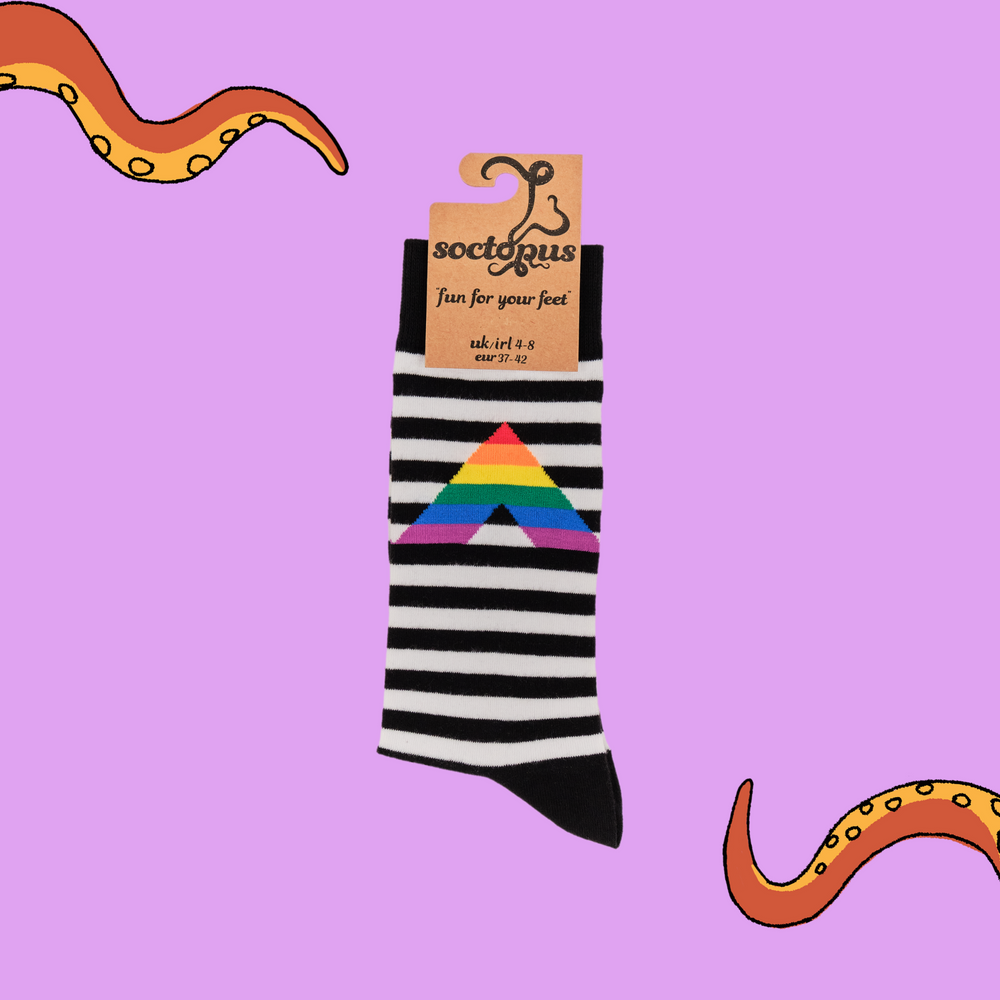 
                      
                        A pair of socks depicting a rainbow ally sign. Black and white striped legs, black cuff, heel and toe. In Soctopus Packaging.
                      
                    