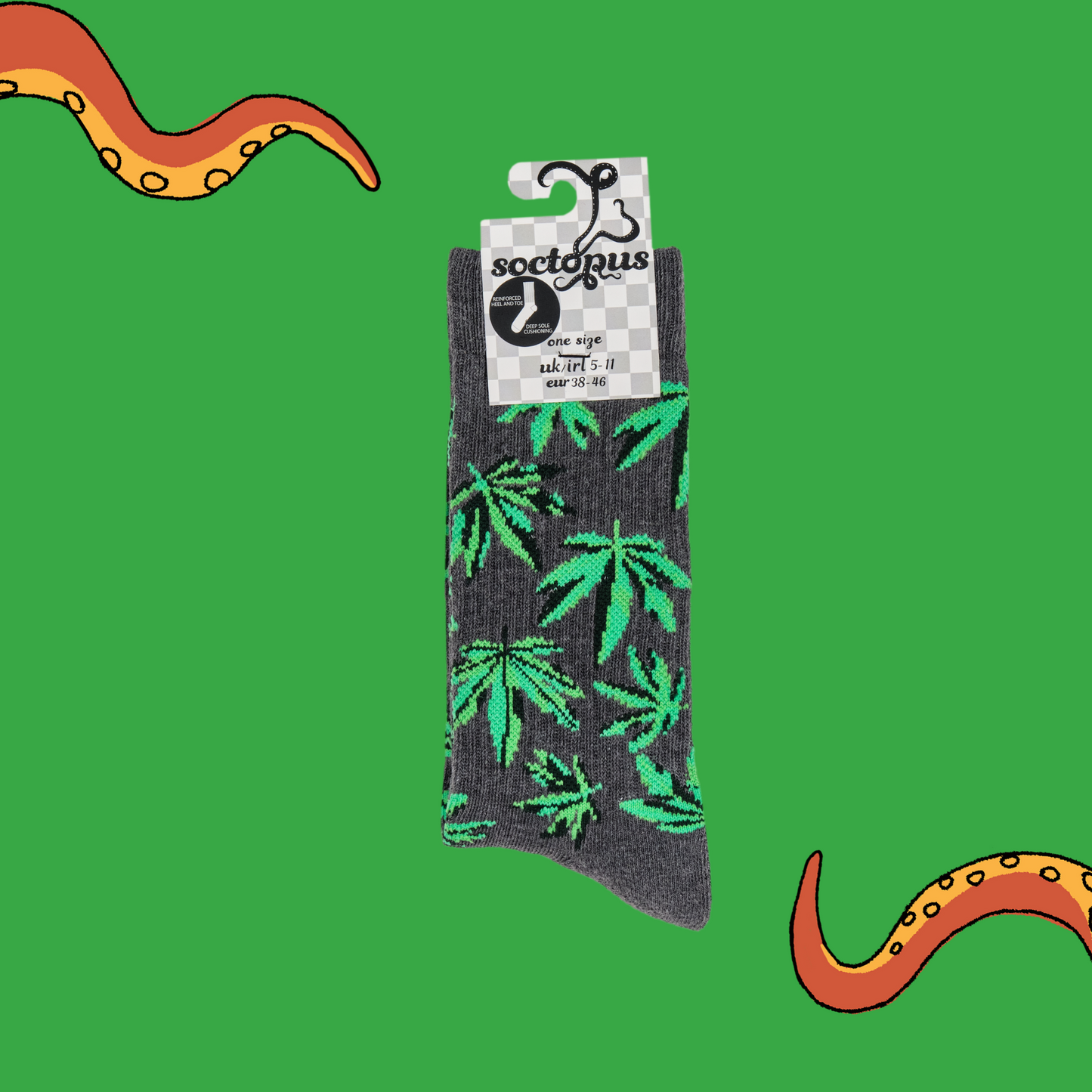 
                  
                    A pair of socks depicting cannabis leaves. Grey athletic legs, grey cuff, heel and toe. In Soctopus Packaging.
                  
                