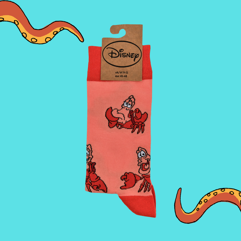 
                      
                        A pair of socks depicting Sebastian from The Little Mermaid. Coral legs, orange cuff, toe and heel.
                      
                    