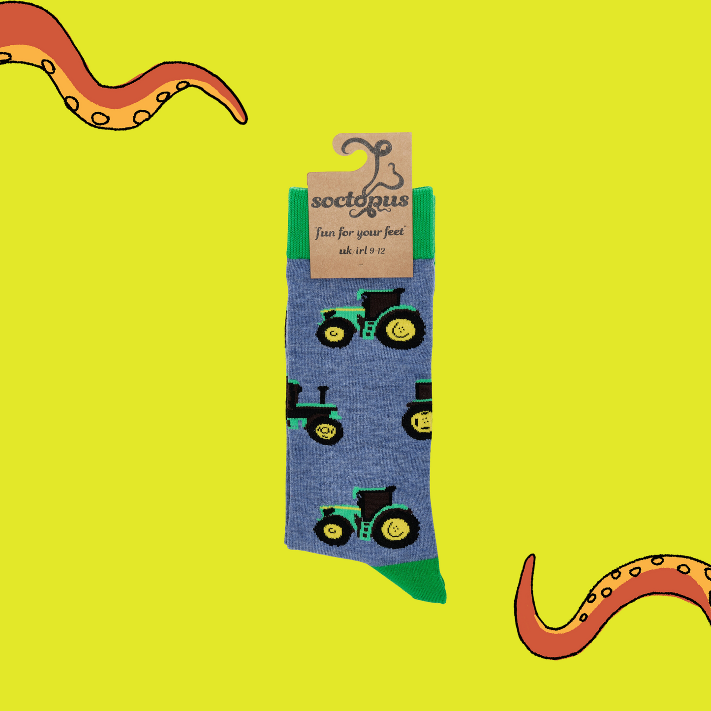 
                  
                    A pair of socks depicting green tractors. Blue legs, green cuff, heel and toe. In Soctopus Packaging.
                  
                