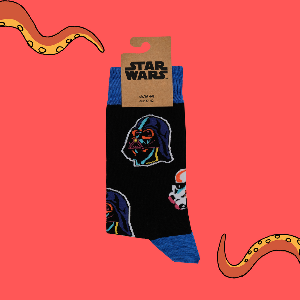 
                      
                        A pair of socks depicting stormtroopers and Darth Vader. Black legs, blue cuff, toe and heel.
                      
                    