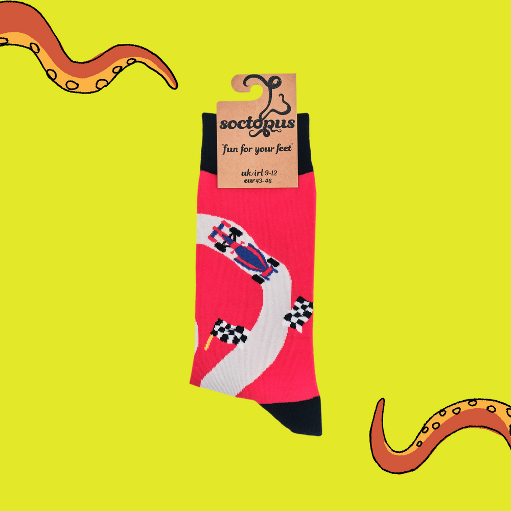 
                      
                        A pair of socks depicting F1 cars. Red legs, black cuff, heel and toe. In Soctopus Packaging.
                      
                    