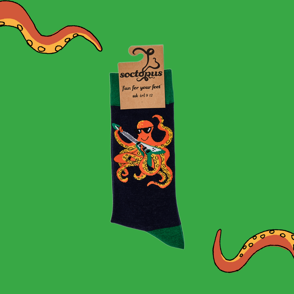 
                      
                        A pair of socks depicting an octopus playing a pink guitar. Dark blue legs, green cuff, heel and toe.
                      
                    