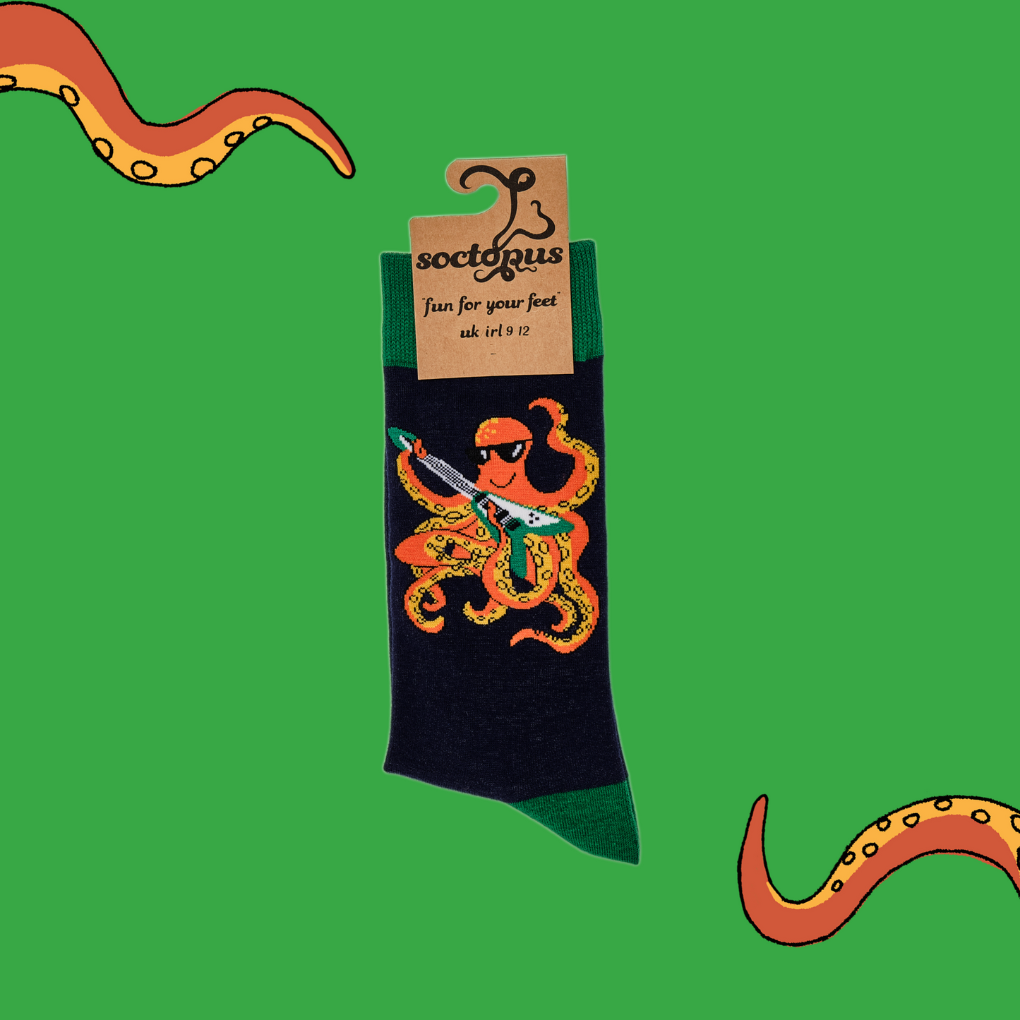 
                  
                    A pair of socks depicting an octopus playing a pink guitar. Dark blue legs, green cuff, heel and toe.
                  
                
