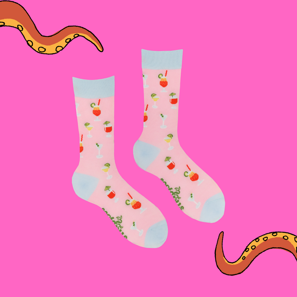 
                      
                        A pair of socks with a cocktail motif. Pink legs, light blue heel toe and cuff. 
                      
                    