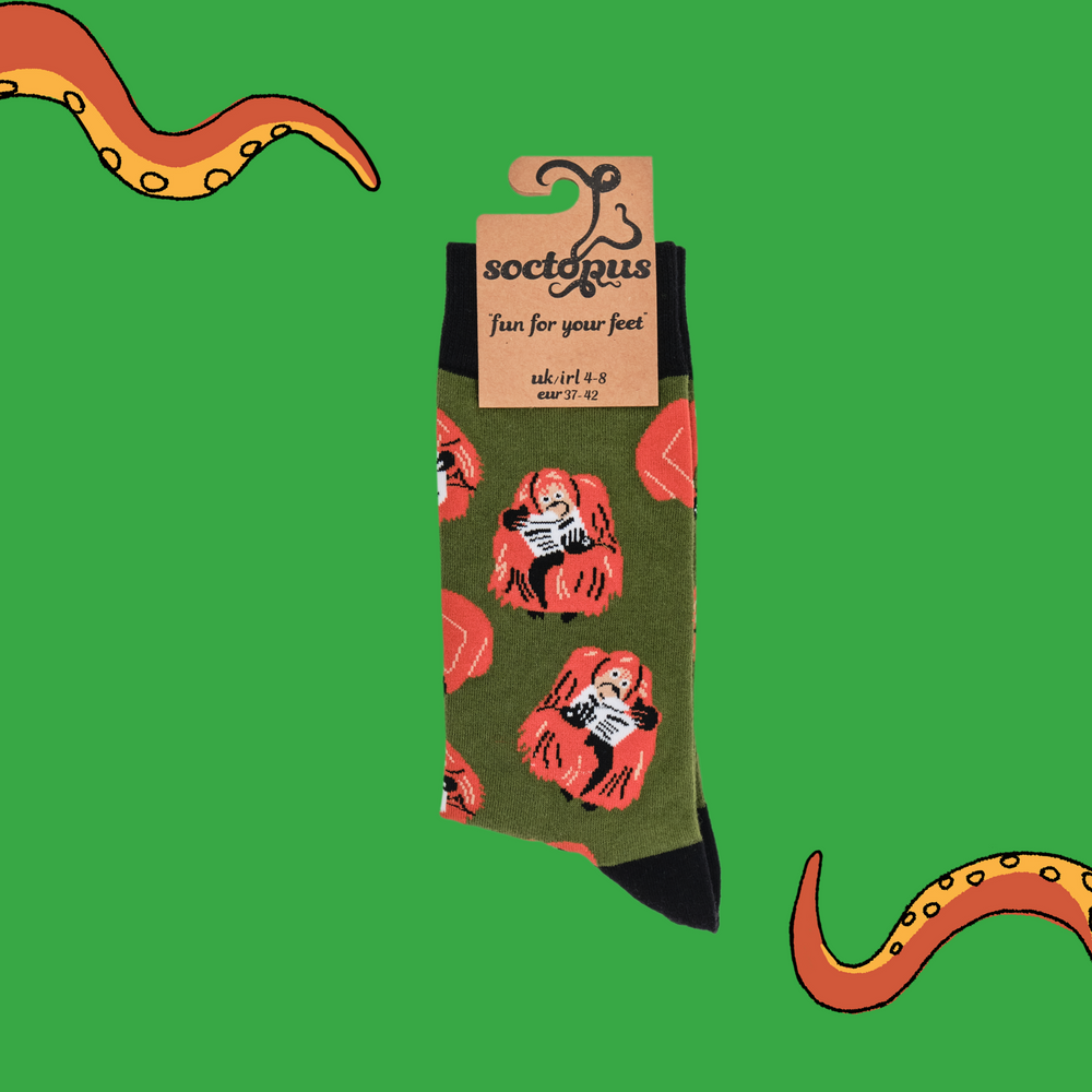 
                  
                    A pair of socks depicting clever Orangutans. Green legs, black cuff, heel and toe. In Soctopus Packaging.
                  
                
