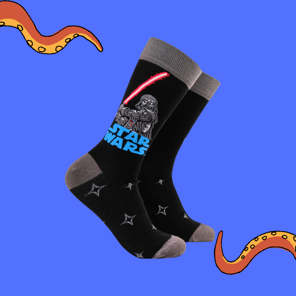 
                      
                        A pair of socks featuring Darth Vader. Black legs, grey toe, heel and cuff. 
                      
                    