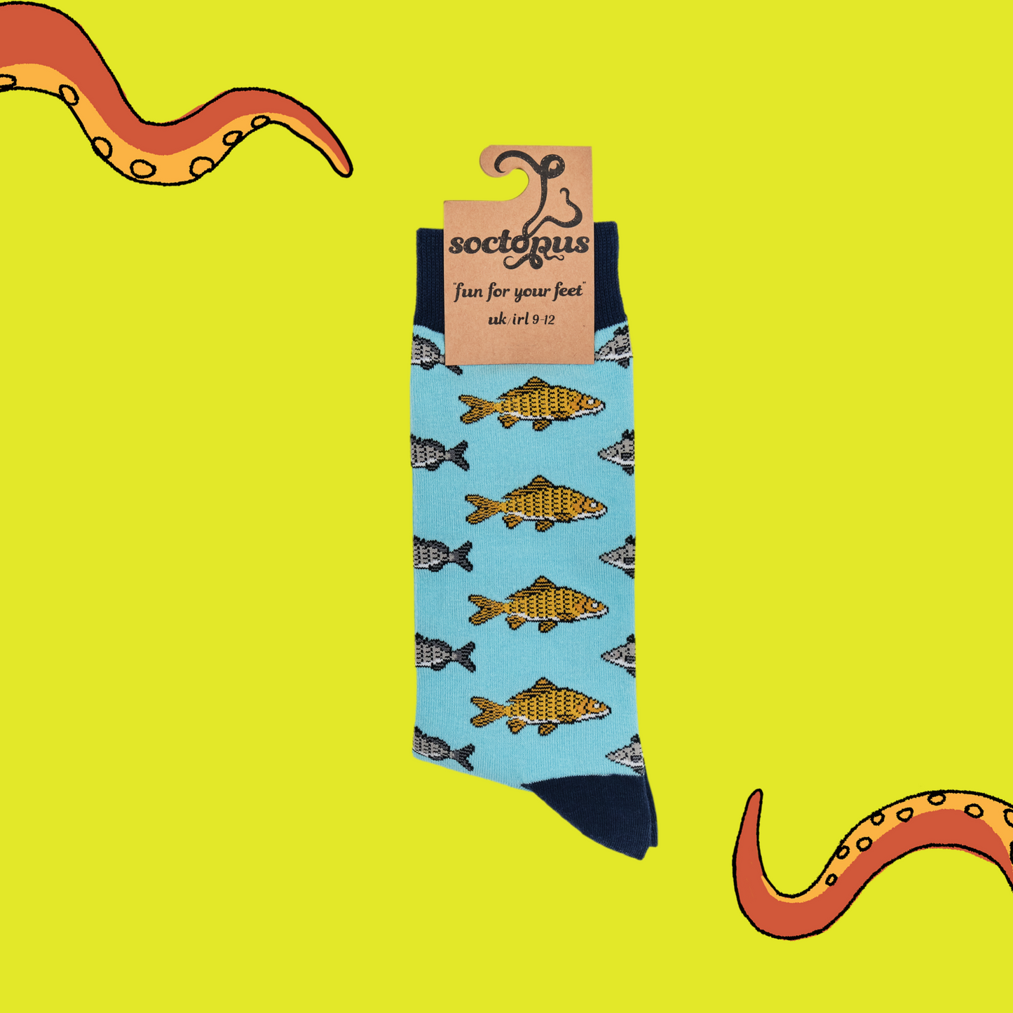 
                  
                    A pair of socks depicting Koi carp fish. Blue legs, dark blue cuff, heel and toe. In Soctopus Packaging.
                  
                