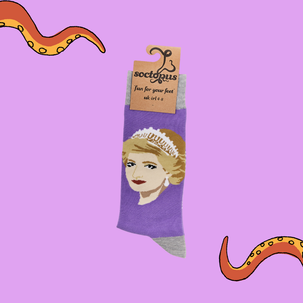 
                  
                    A pair of socks depicting princess Diana. Purple legs, grey cuff, heel and toe. In Soctopus Packaging.
                  
                