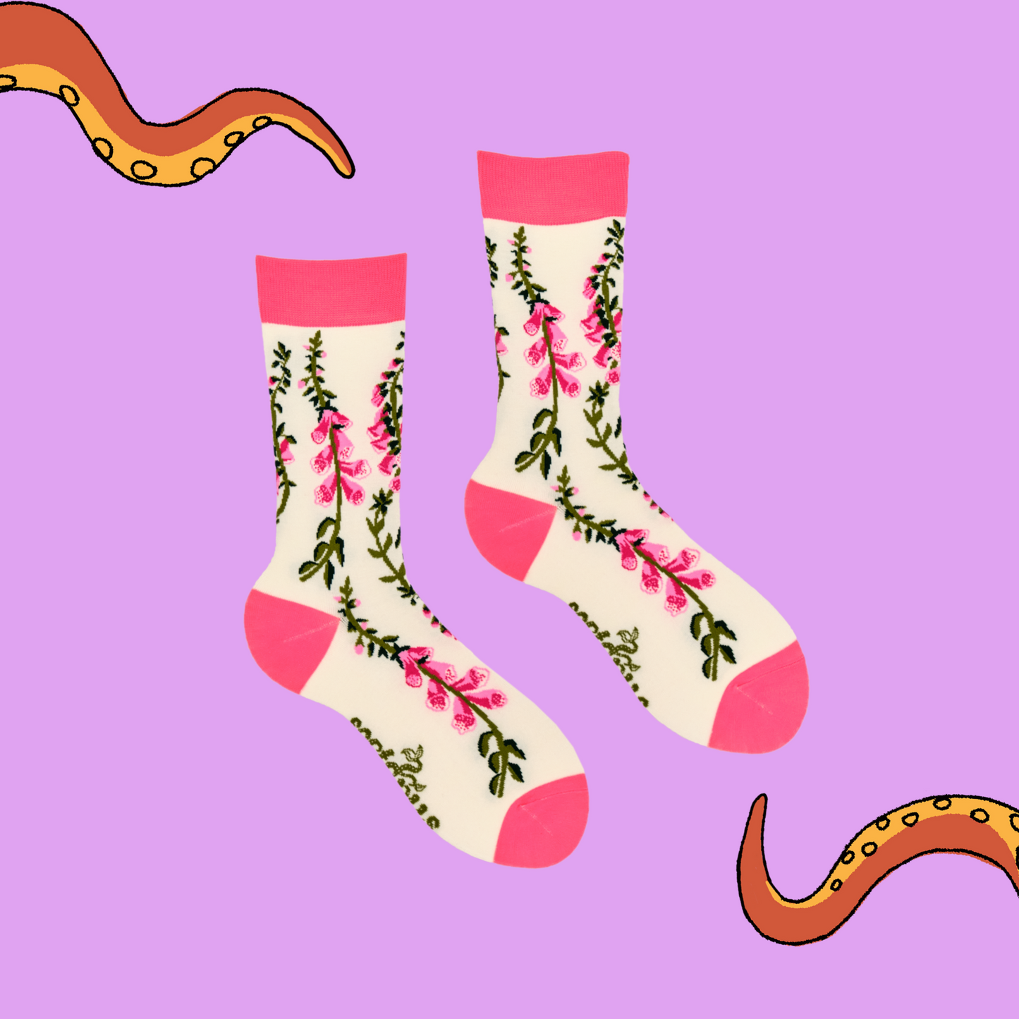 
                  
                    A pair of socks depicting fox gloves. Cream legs, pink cuff, heel and toe.
                  
                