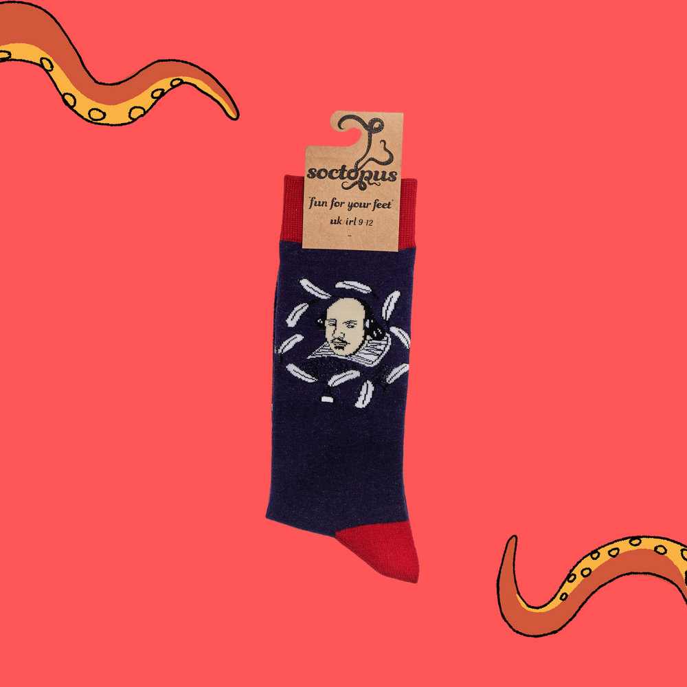 
                  
                    A pair of socks depicting William Shakespeare. Purple legs, red cuff, heel and toe. In Soctopus Packaging. 
                  
                
