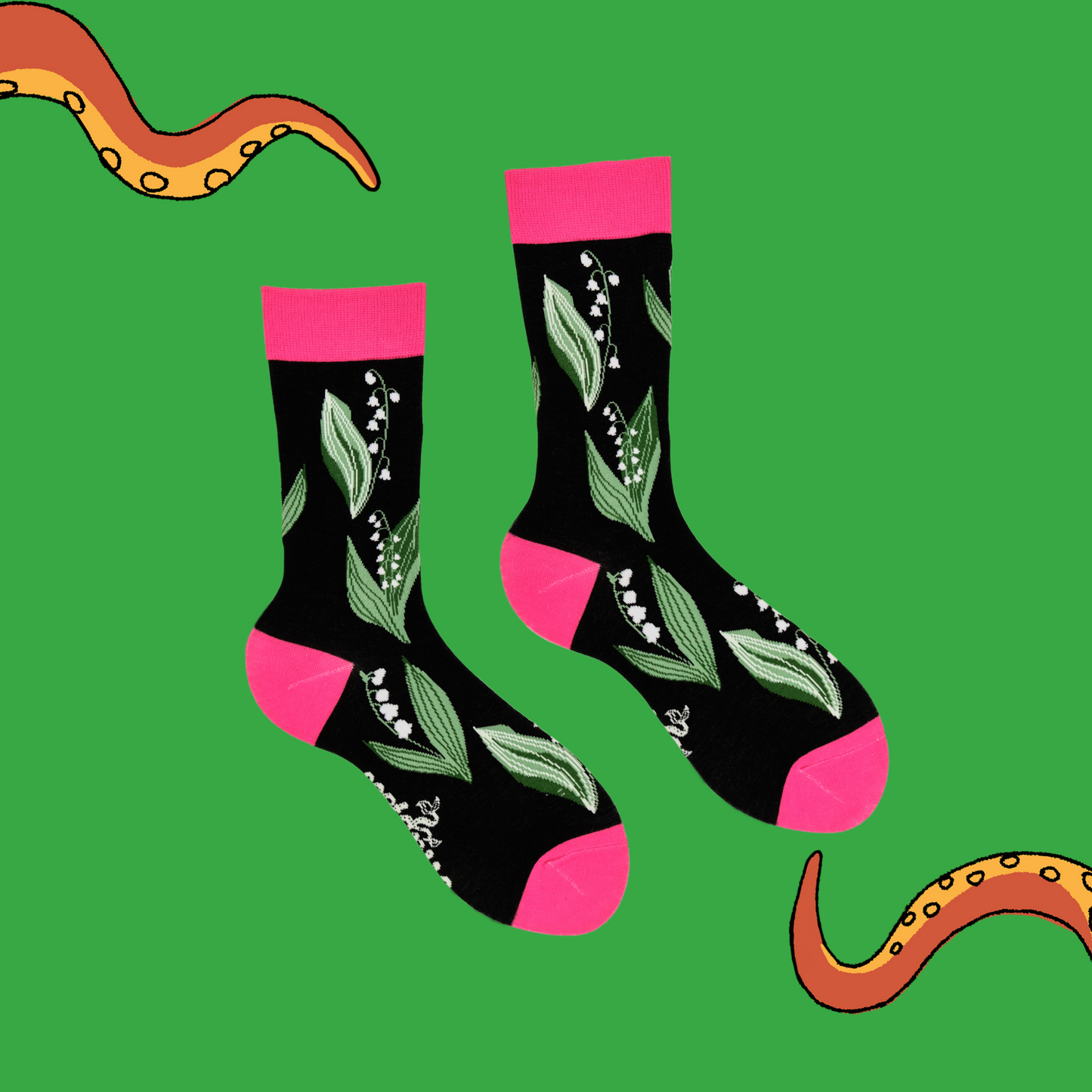 
                  
                    A pair of socks depicting Lilly of the Morning flowers. Black legs, pink cuff, heel and toe.
                  
                